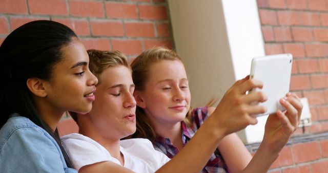 Group of Teenage Friends Taking a Selfie Together - Download Free Stock Images Pikwizard.com