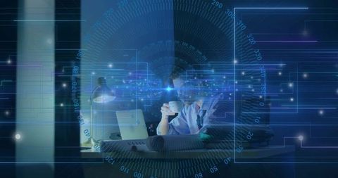 Businessman Analyzing Technology Under Digital Interface in Office at Night