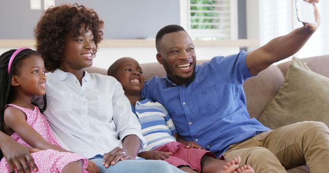 Happy Family Taking Selfie on Couch - Download Free Stock Images Pikwizard.com