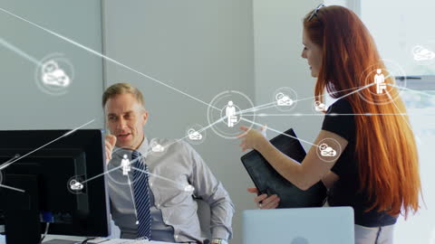 Colleagues Discussing in Office with Digital Network Overlay