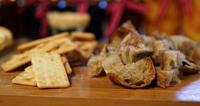 Crackers and Rustic Bread Bites on Wooden Board During Holiday Celebration - Download Free Stock Images Pikwizard.com