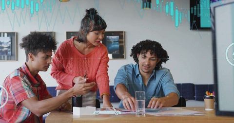 Diverse Team Brainstorming Business Strategy at Modern Conference Room