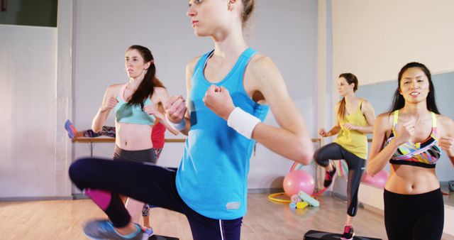 Group of Women Participating in Aerobic Fitness Class - Download Free Stock Images Pikwizard.com