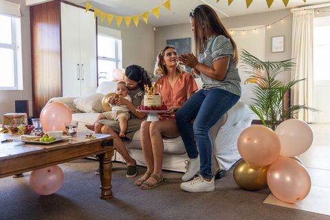 Joyful Home Birthday Celebration with Cake and Friends