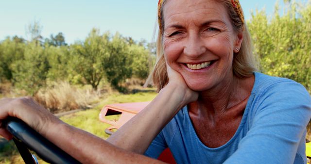 Happy Elderly Woman Enjoying Farm Life in the Countryside - Download Free Stock Images Pikwizard.com