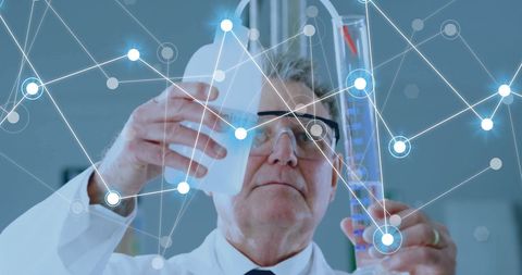 elderly male scientist analyzing experiments in high-tech laboratory - Download Free Stock Images Pikwizard.com
