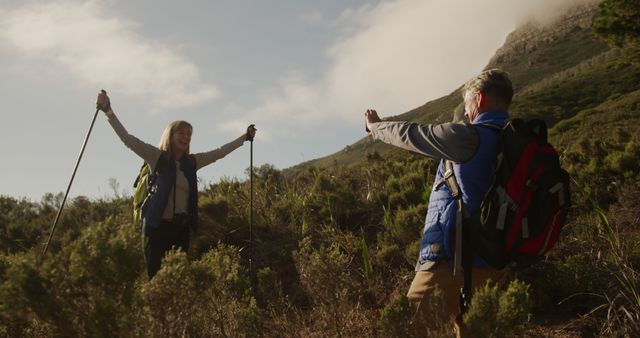 Senior Couple Enjoying Hiking in Mountainous Terrain - Download Free Stock Images Pikwizard.com