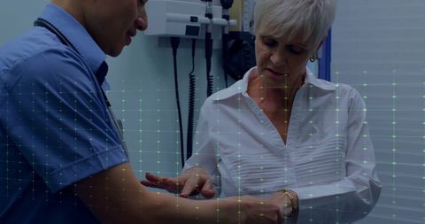 Digital Cardiograph Overlay on Doctor Examining Patient - Download Free Stock Images Pikwizard.com