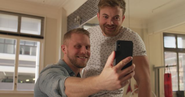 Two Joyful Friends Taking Selfie in Modern Apartment - Download Free Stock Images Pikwizard.com