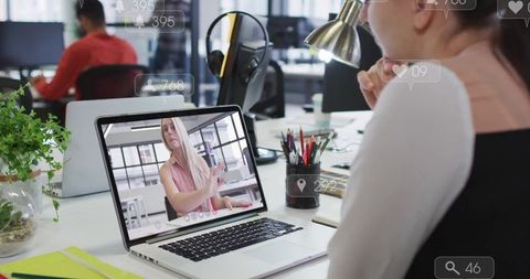 Professional Collaboration via Video Call in Modern Office Environment