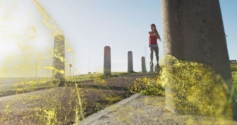 Fit woman running with dynamic digital effects