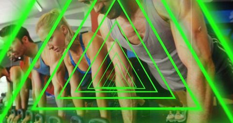 Group performing plank push-ups on kettlebells with neon green triangular overlay