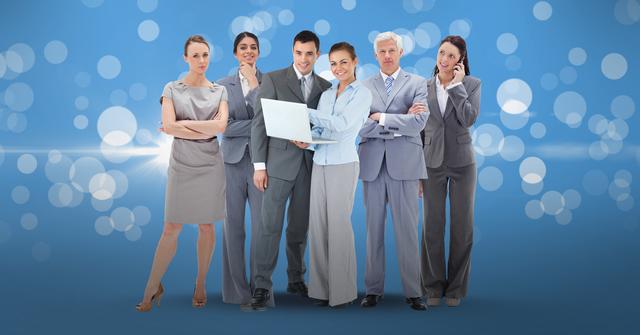 A group of business professionals are standing and holding a laptop against a blue background with bokeh light effects. Ideal for illustrating teamwork, corporate environments, collaboration in the workplace, business meetings, technology integration in business, and professional consulting services.