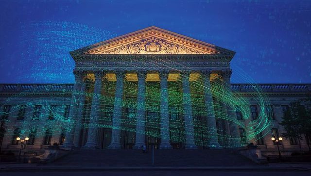 Neoclassical building with digital swirl at night