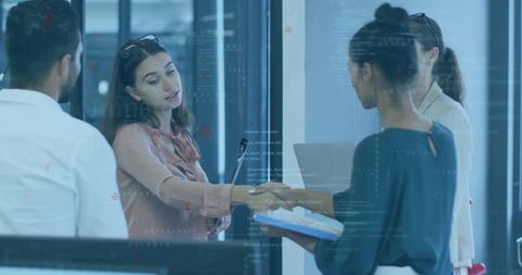 Business Professionals Handshaking Amid Digital Data Overlay - Download Free Stock Images Pikwizard.com