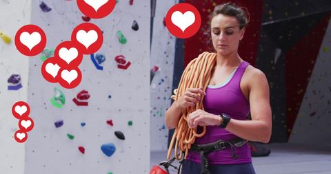Fit Woman with Climbing Rope Using Smartwatch at Gym - Download Free Stock Images Pikwizard.com
