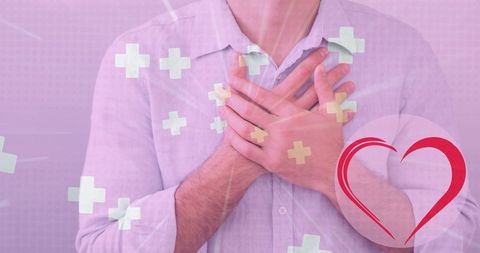 Caucasian man holding chest with health icons showing healthcare theme