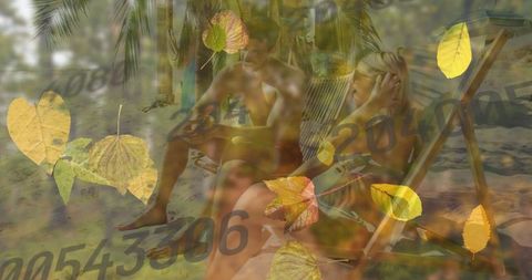 Couple relaxing on tropical beach with falling leaves overlay