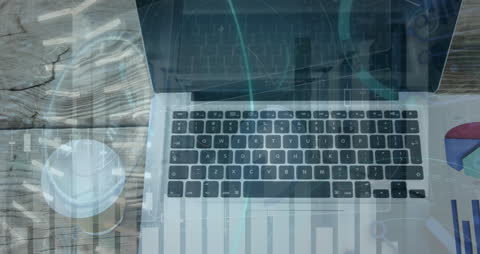 Technology and Business Strategy Concept with Laptop and Charts