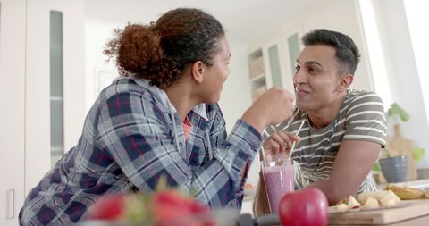 Happy Couple Enjoying Smoothie Together in Modern Kitchen - Download Free Stock Images Pikwizard.com