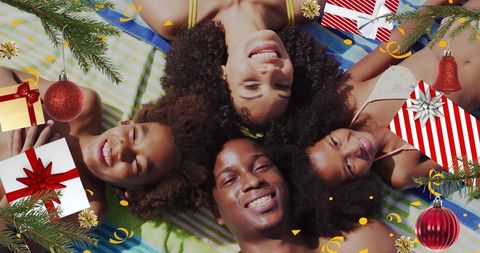 Joyful Family Bonding on Beach During Festive Vacation