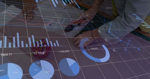 Fashion Design Team Analyzing Trends with Modern Technology Overlay