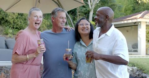 Joyful Diverse Friends Enjoying Outdoor Gathering