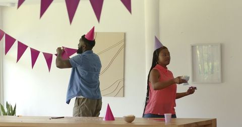 Festive decoration with purple banners