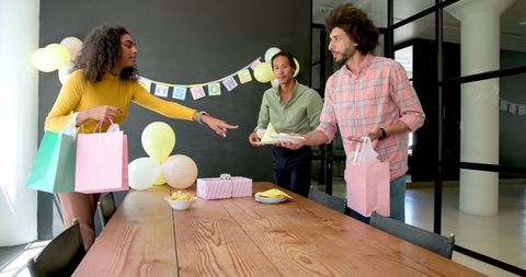 Colleagues Preparing Together for Office Baby Shower