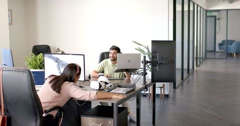 Coworkers Discussing Robotics Design in Modern Office - Download Free Stock Images Pikwizard.com