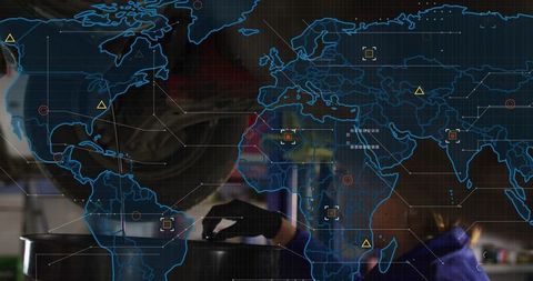 Female technician inspecting industrial pot at workstation with holographic world map overlay