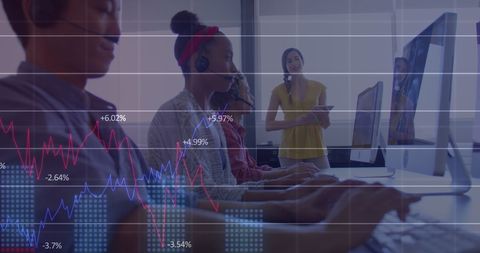 Diverse Team Engaging with Stock Market Analysis in Modern Office - Download Free Stock Images Pikwizard.com