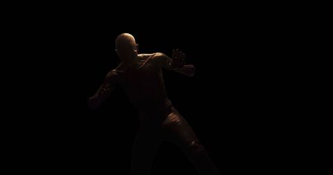 Despairing figure in dark room represents inner struggle