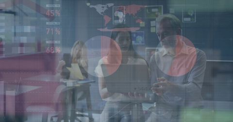 Diverse Professionals Analyzing Global Business Data in Modern Office