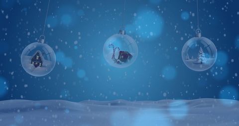 Festive Snowy Christmas Ornaments Hanging in Wintry Scene