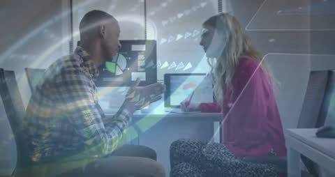 Business Professionals Analyzing Data in Modern Office with Digital Charts