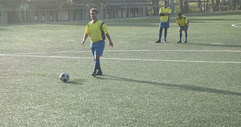 Youth Soccer Player Kicking Ball on Open Field During Practice - Download Free Stock Images Pikwizard.com