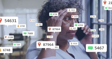 Senior woman holding phone rubbing forehead with floating notifications showing digital overload