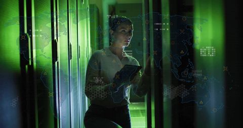 Female IT Technician Analyzing Data in Server Room with Global Connection Visuals - Download Free Stock Images Pikwizard.com