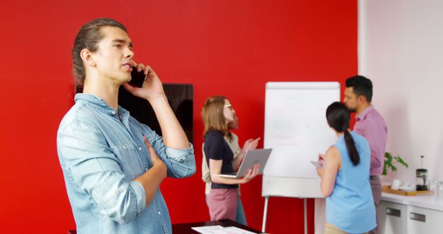 Young Professionals Collaborating in Office Meeting Room - Download Free Stock Images Pikwizard.com