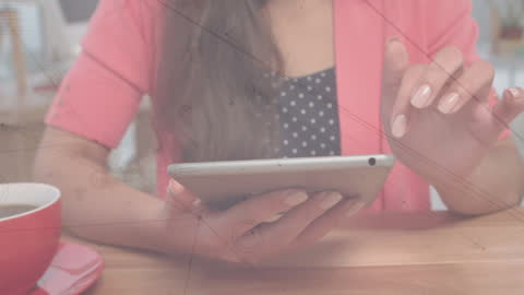 Businesswoman Using Tablet for Data Analysis