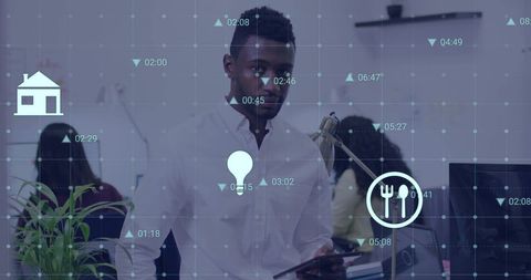 Diverse team in modern office with digital media overlay