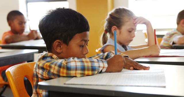 Focused Multiracial Students Writing in Classroom - Download Free Stock Images Pikwizard.com