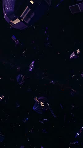 Panning through derelict satellite field revealing drifting capsule with yellow arm