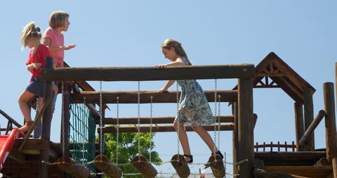 Children Exploring Wooden Playground Structure under Blue Sky - Download Free Stock Images Pikwizard.com