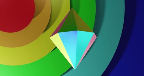 Multicolored 3d prism on vibrant rainbow background
