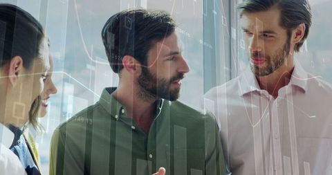 Collaborative Business Professionals Analyzing Financial Data