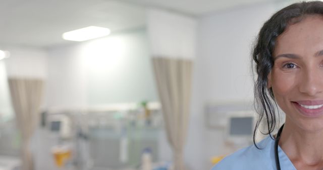 Smiling Nurse in Scrubs Standing in Hospital Room - Download Free Stock Images Pikwizard.com