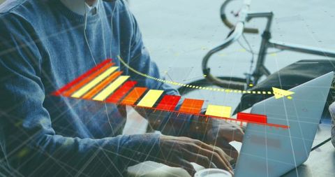 Analyzing data on laptop with 3d bar chart overlay in urban outdoor workspace