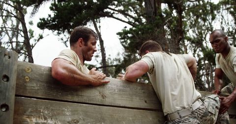 Teamwork Skills in Tough Military Obstacle Training - Download Free Stock Images Pikwizard.com